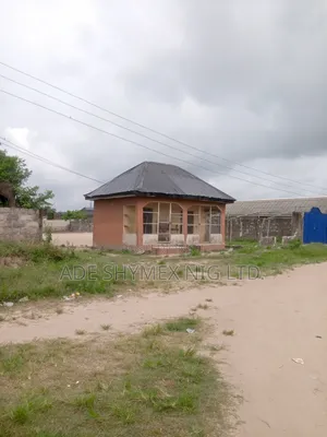 Full Plot of Land and 2shops