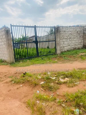 Half Plot of Land Fenced With Gate and Borehole