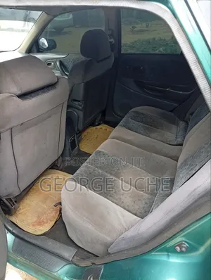 Mazda 323 2005 Green