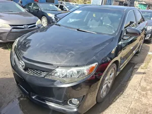 Toyota Camry SE Sport 4dr Sedan w/Prod. End 11/13 (2.5L 4cyl 6A) 2014