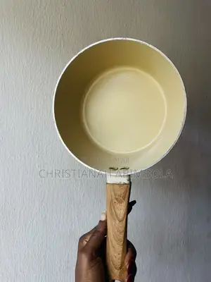 Neatly Used Ceramic Saucepan With Lid