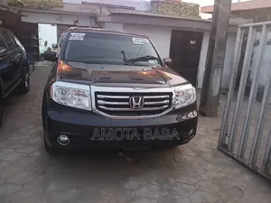 Honda Pilot Touring w/RES/Navi 4WD (3.5L 6cyl 5A) 2012 Brown