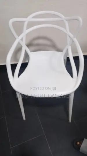 Marble Table and White Hard Plastic Chair