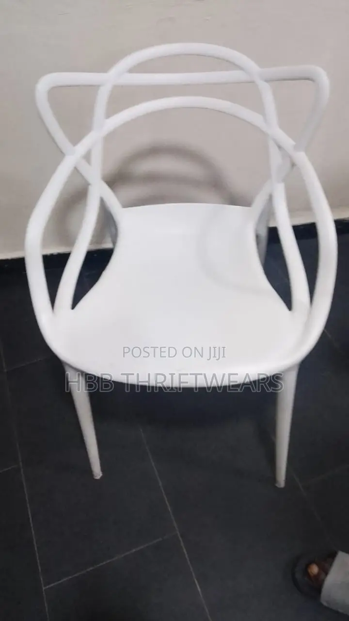 Marble Table and White Hard Plastic Chair