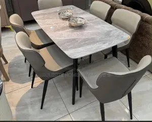 Contemporary 6-Seater Dining Set – Marble Table With Cushioned Chairs