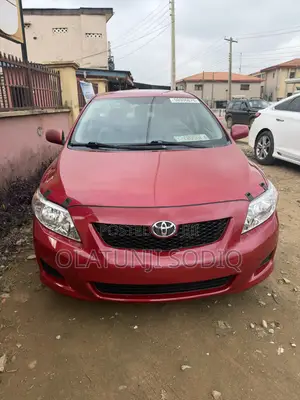 Toyota Corolla LE 4dr Sedan (1.8L 4 cyl 4A) 2009 Red