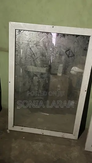 2 Neatly Used Sliding Door With Makeup Sticker on It and 2 Mirrors