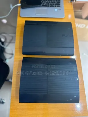 Playstation 3 Super Slim  Used With Games and 2 Controllers