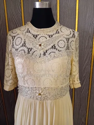 Beaded, Layered Dinner Gown.
