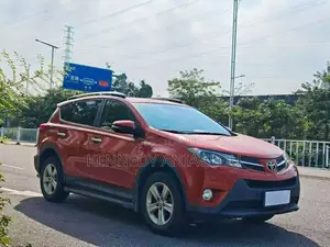 Toyota RAV4 XLE AWD (2.5L 4cyl 6A) 2013 Orange