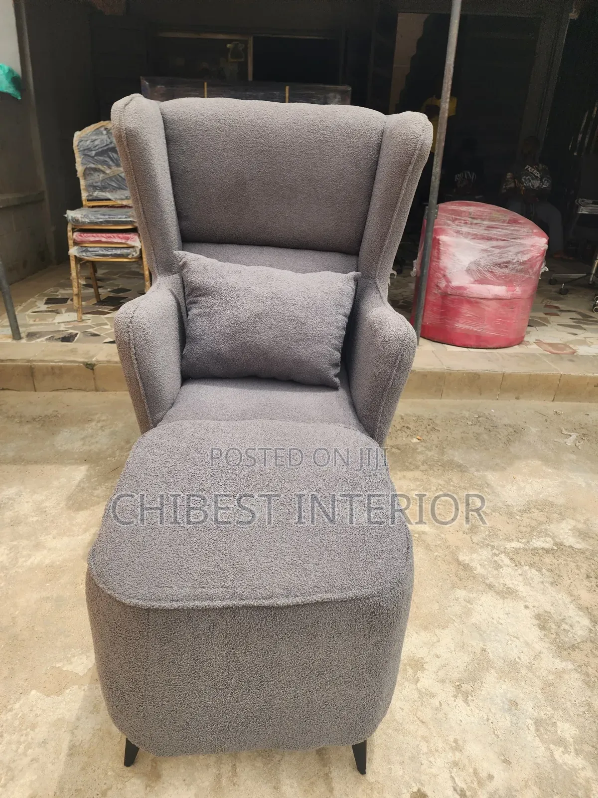 Neatly Padded Sofa With Leg Rest.