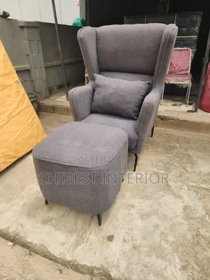 Neatly Padded Sofa Couch With Leg Rest.
