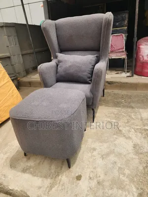 Neatly Padded Sofa Couch With Leg Rest.