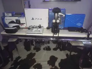 PS 4 Slim Console and VR Set