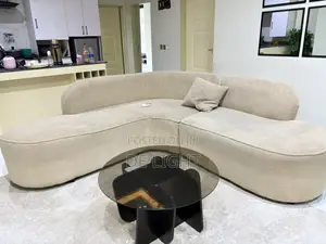 Neatly Used L-Shaped Sofa Made With Shaggy Fabric With a Single