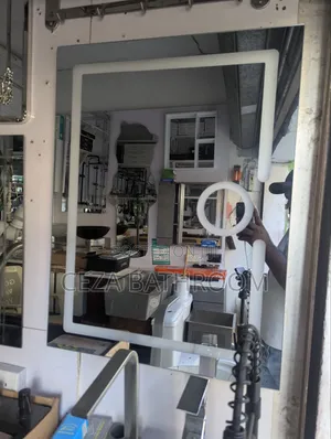 Rectangular Backlit LED Wall Mirror With a Built-in Touch Sensor