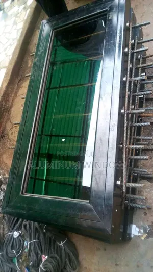 Casement Window and Wrought Iron With Net