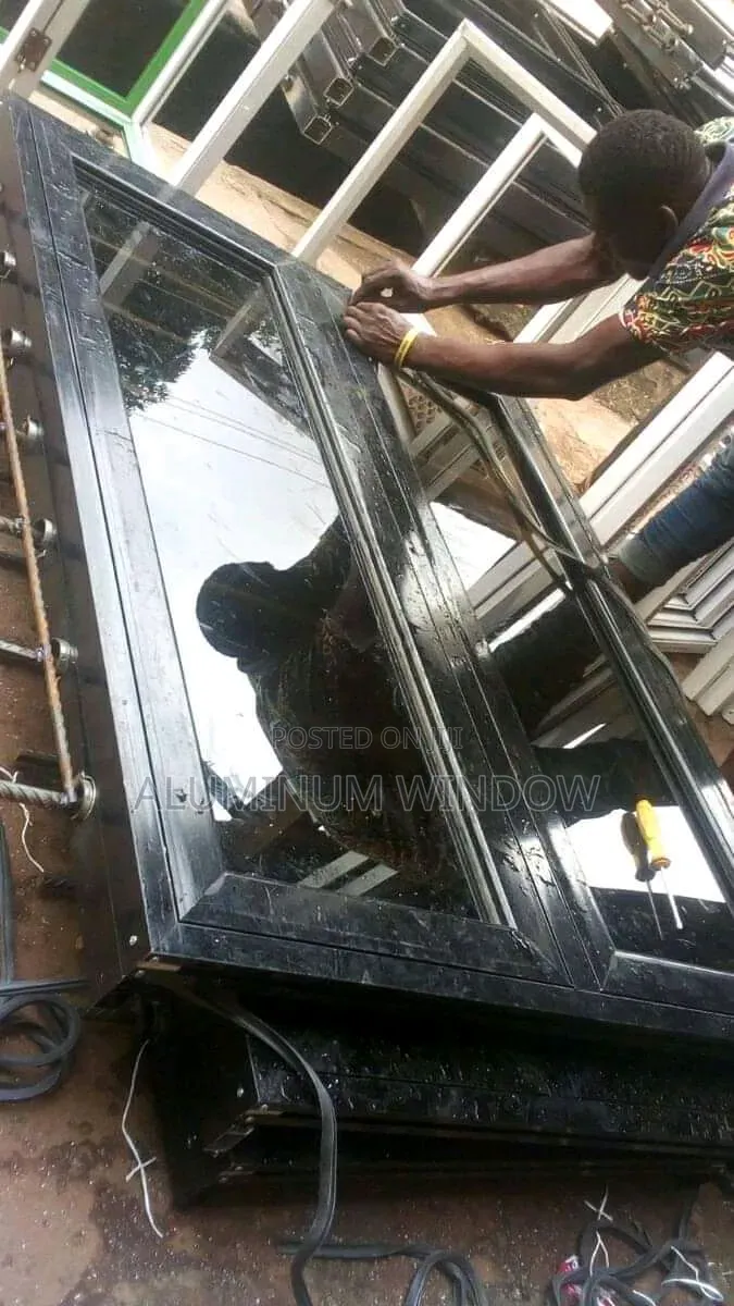 Casement Window and Wrought Iron With Net