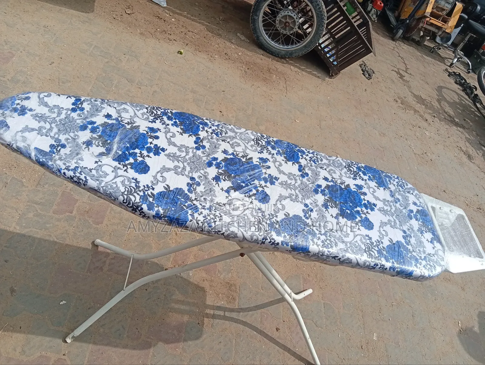 Foreign Foldable Ironing Board With Metallic Rest".
