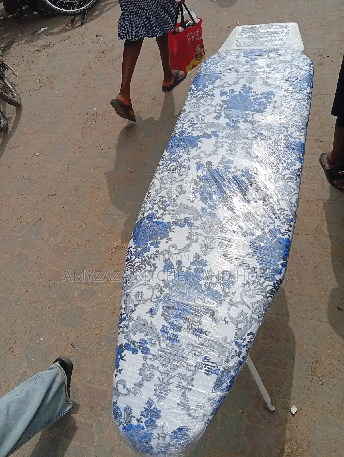 Foreign Foldable Ironing Board With Metallic Rest".