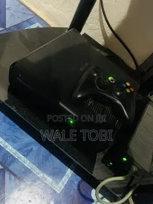 Neatly Used XBOX 360 SLIM FOR SALE  Clean and 100% Original.