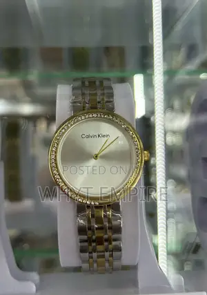 Calvin Klein Women's Silver and Gold Strap Watch