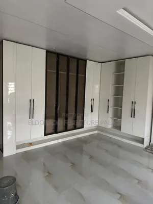 L-Shape Wardrobe Design With Glass Profile Door