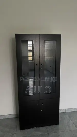 Dark Brown Cupboard With See Through Glass