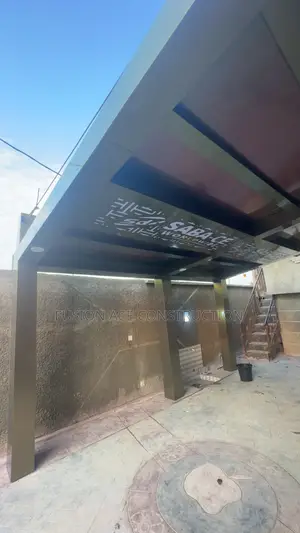 Cladded Modern Carport With Lights and Laser Cut Perforated Design