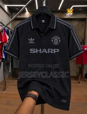 Manchester United Retro Black Polo Jersey – Adidas Classic Design