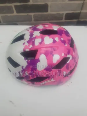 Bell Sidetrack Child Cycling Helmet in a Pink-and-White Heart Pattern