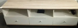 Neatly Used TV Console With 3 Drawers and Shelves
