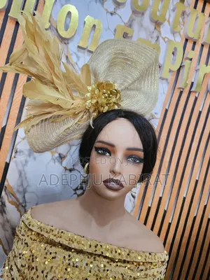 Beautiful Gold Feather Fascinator