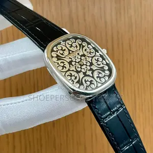 Patek Philippe Rose Gold Tonneau Watch | Floral Elegance