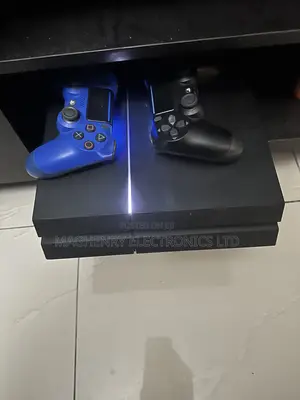 Ps4 1terabyte With All Accessories and 2 Pads, Plus 17 Games Inside.