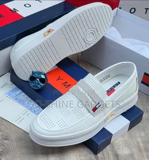 Tommy Hilfigers Men Hybrid Perforated Penny Loafer Platform Shoe