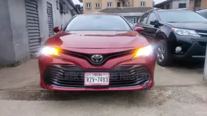 Toyota Camry LE FWD (2.5L 4cyl 8AM) 2018 Red