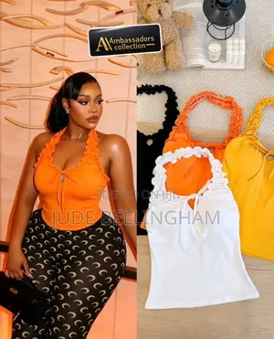 Ladies Yellow Polo Top Wholesale 4700 Retail 5500 Onitsha