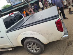 Fiber Folding Cover for Nissan Frontier # at ×