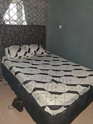 A Set of Bed and Bed Stand