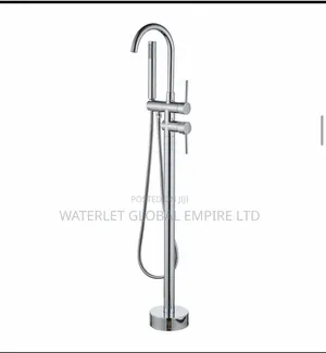 Floor-Mounted Bathtub Filler Faucet With Handheld Shower Wand.