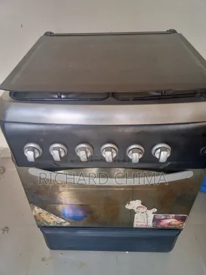 Faily Used Three Burner Gas Cooker With Oven and Grills