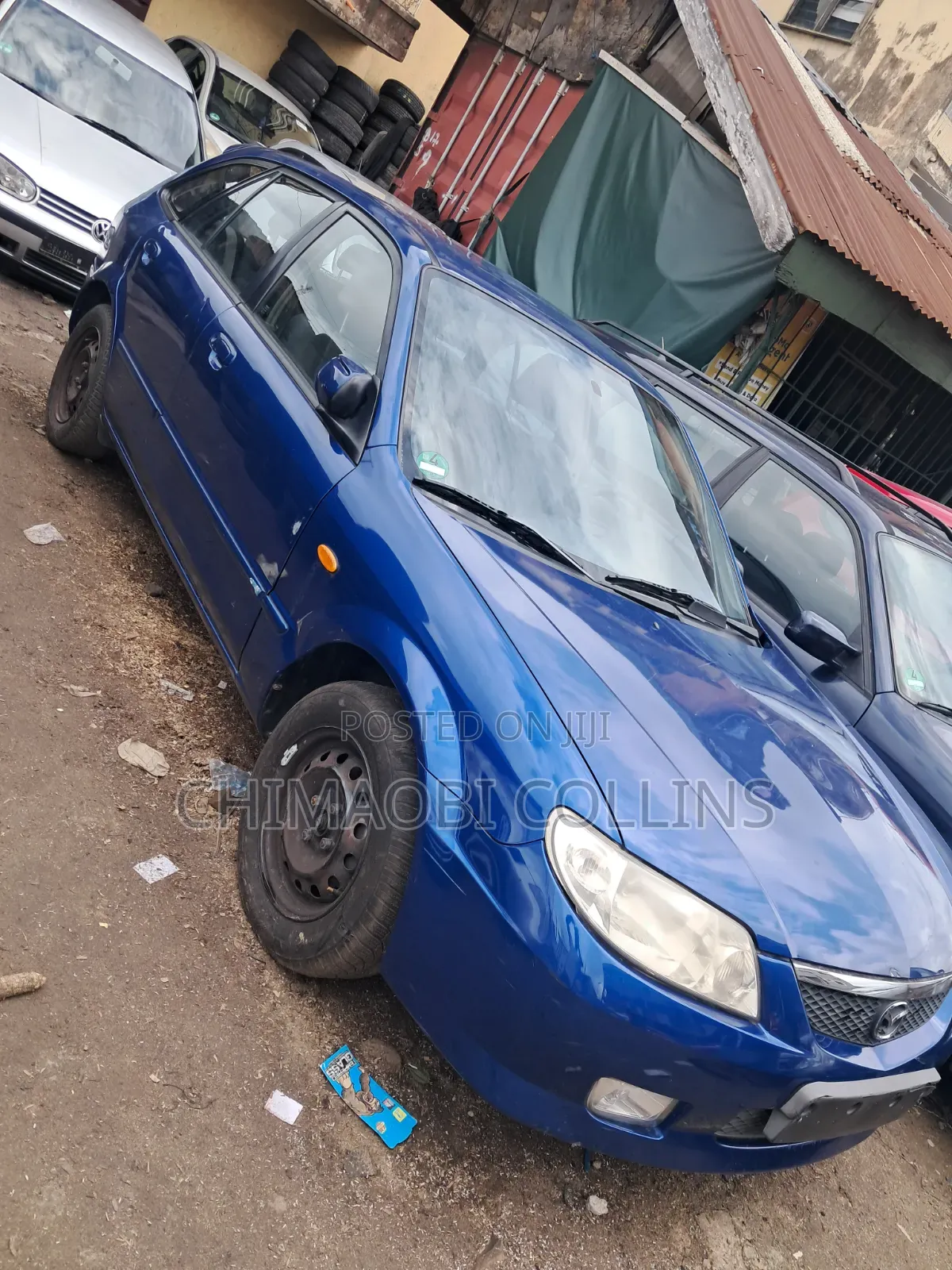 Mazda 323 2004 Blue