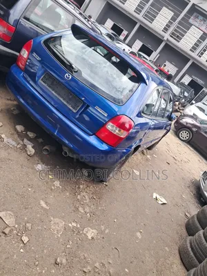 Mazda 323 2004 Blue