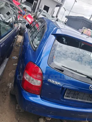 Mazda 323 2004 Blue