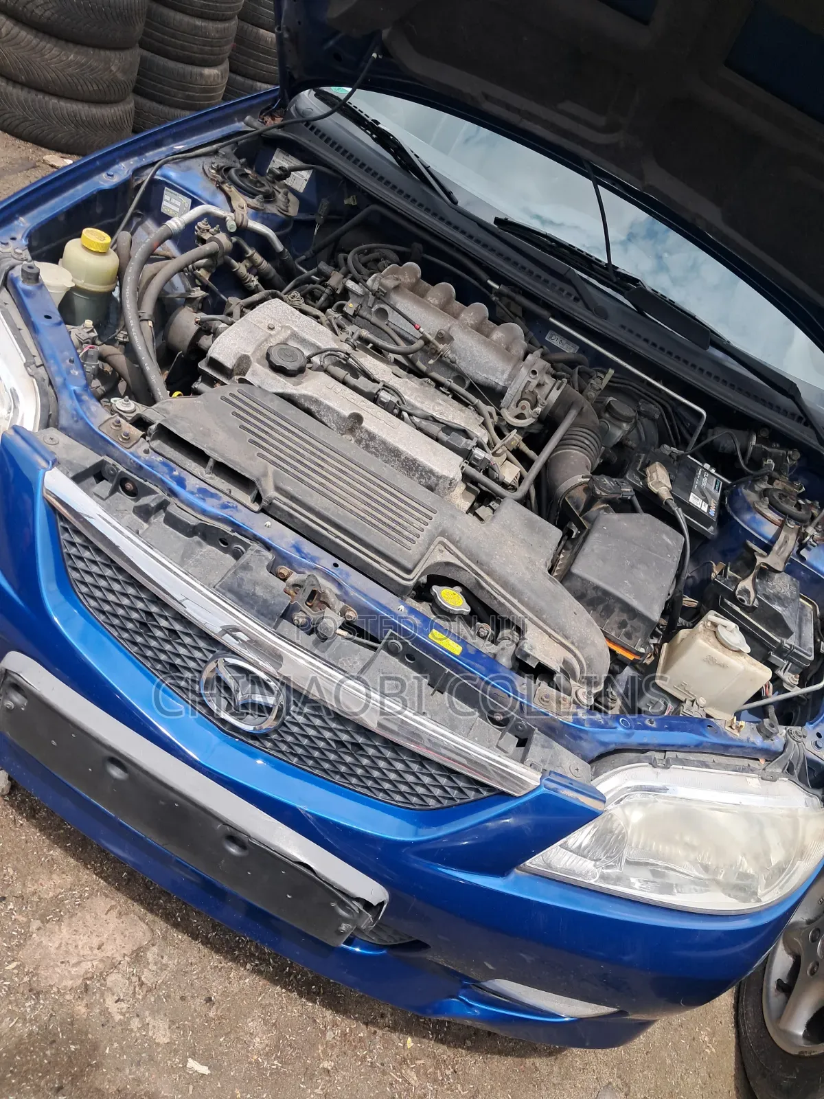Mazda 323 2004 Blue
