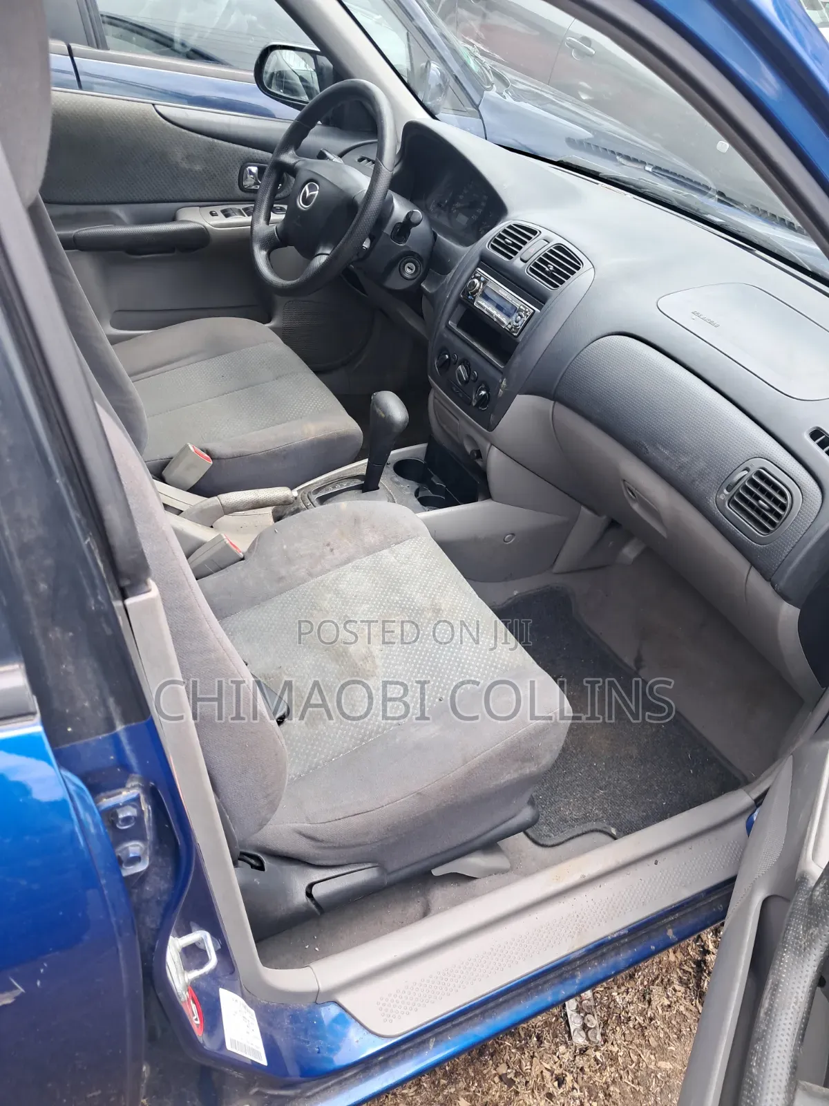 Mazda 323 2004 Blue