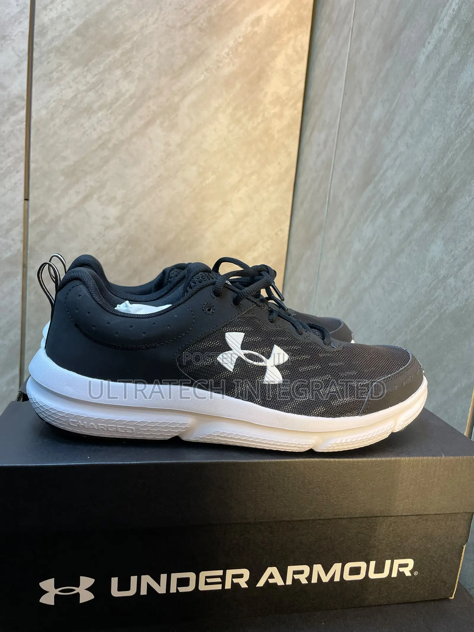 UNDER ARMOUR Men’s Charged Assert Running Shoe