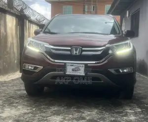 Honda CR-V Touring 4dr SUV AWD (2.4L 4cyl CVT) 2015 Red