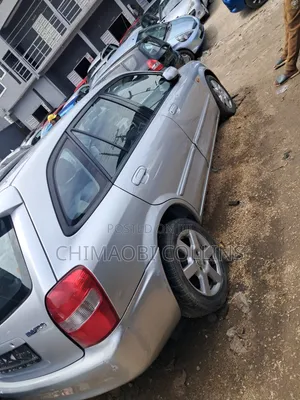 Mazda 323 2004 Silver
